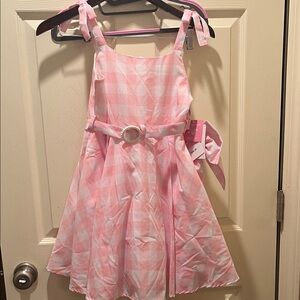 Girls Pink Gingham Dress with Belt similar to the Barbie movie. Comes with bow